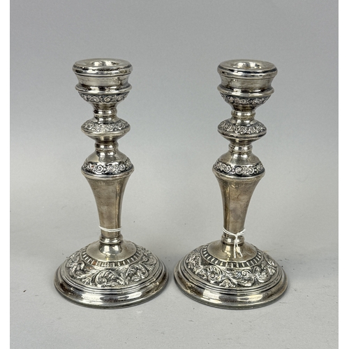 147 - A PAIR OF SILVER WEIGHTED CANDLESTICKS
19 cm H