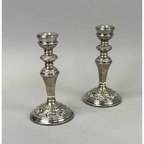 147 - A PAIR OF SILVER WEIGHTED CANDLESTICKS
19 cm H