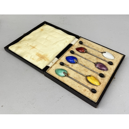 151 - A SET OF SILVER AND COLOURED GUILLOCHE ENAMEL COFFEE SPOONS IN BOX
Total silver weight: 54gms... 