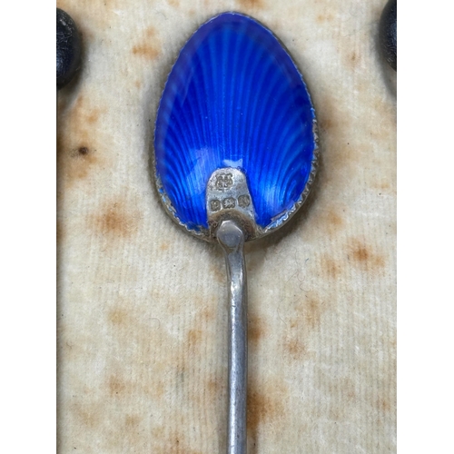 151 - A SET OF SILVER AND COLOURED GUILLOCHE ENAMEL COFFEE SPOONS IN BOX
Total silver weight: 54gms... 