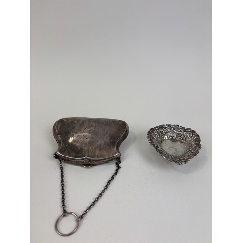 156 - A SILVER PURSE AND RETICULATED BON BON DISH
125gms