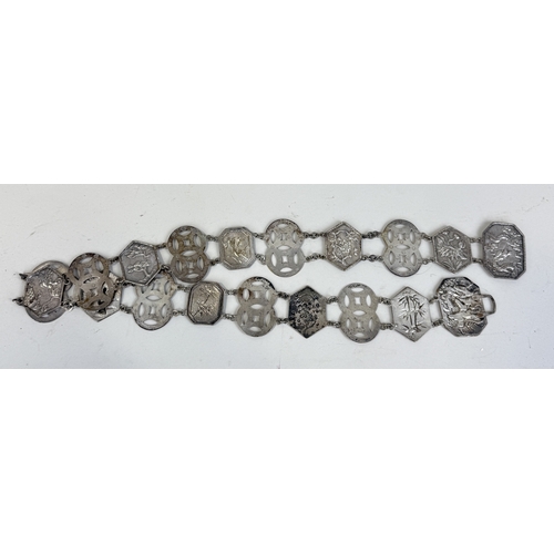 159 - A CHINESE SILVER BELT
Weight: 137gms
81cm L
