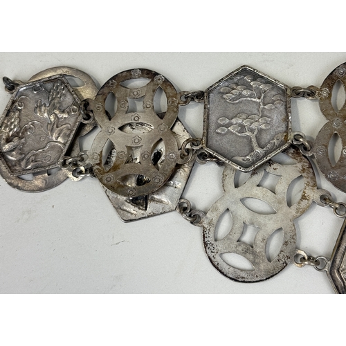 159 - A CHINESE SILVER BELT
Weight: 137gms
81cm L
