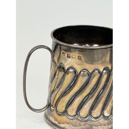 161 - TWO SILVER CUPS TOGETHER WITH A PEWTER CUP
Total silver weight: 130gms