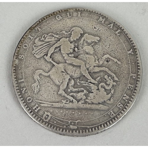 162 - A GEORGE III 1820 SILVER CROWN COIN
In protective sleeve.
3.7 cm Diameter