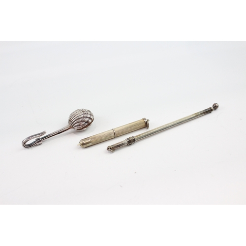 244 - THREE .925 STERLING SILVER SWIZZLE STICK, NAPKIN CLIP & TOOTHPICK
20gms