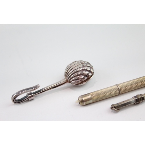 244 - THREE .925 STERLING SILVER SWIZZLE STICK, NAPKIN CLIP & TOOTHPICK
20gms