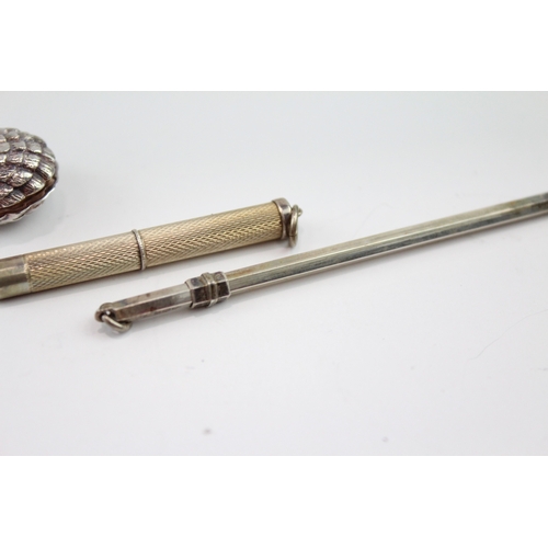 244 - THREE .925 STERLING SILVER SWIZZLE STICK, NAPKIN CLIP & TOOTHPICK
20gms