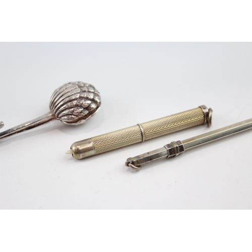 244 - THREE .925 STERLING SILVER SWIZZLE STICK, NAPKIN CLIP & TOOTHPICK
20gms
