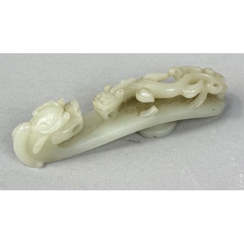 249 - A 19TH CENTURY CHINESE JADE DRAGON BELT HOOK
10cm L