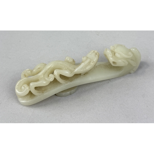 249 - A 19TH CENTURY CHINESE JADE DRAGON BELT HOOK
10cm L