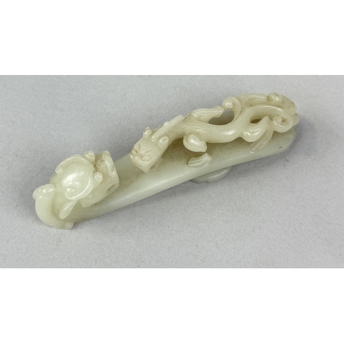 249 - A 19TH CENTURY CHINESE JADE DRAGON BELT HOOK
10cm L
