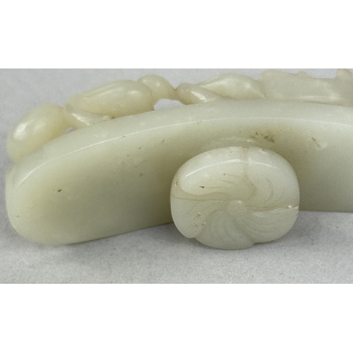 249 - A 19TH CENTURY CHINESE JADE DRAGON BELT HOOK
10cm L
