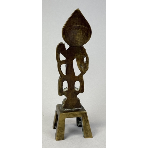 255 - A CHINESE BRONZE FIGURE OF THE GUANYIN
Calligraphy on the stand.
13cm H
 ... 