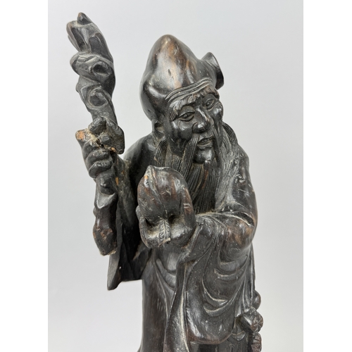 261 - A LARGE CHINESE FIGURE OF THE GOD OF LONGEVITY, SHOULAO HOLDING THE PEACH
43cm H