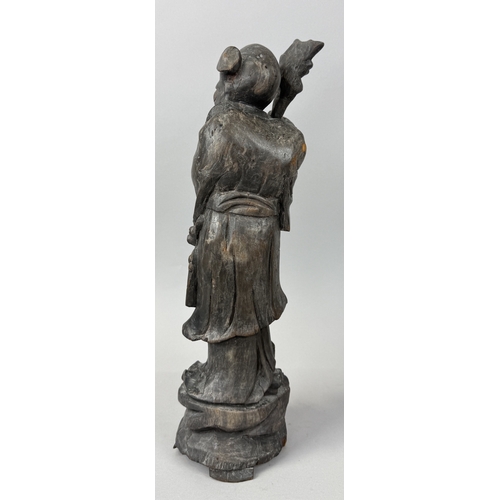 261 - A LARGE CHINESE FIGURE OF THE GOD OF LONGEVITY, SHOULAO HOLDING THE PEACH
43cm H