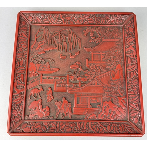 270 - A CHINESE RED LACQUERED SQUARE DISH, MING DYNASTY IN STYLE
39cm x 39cm
 