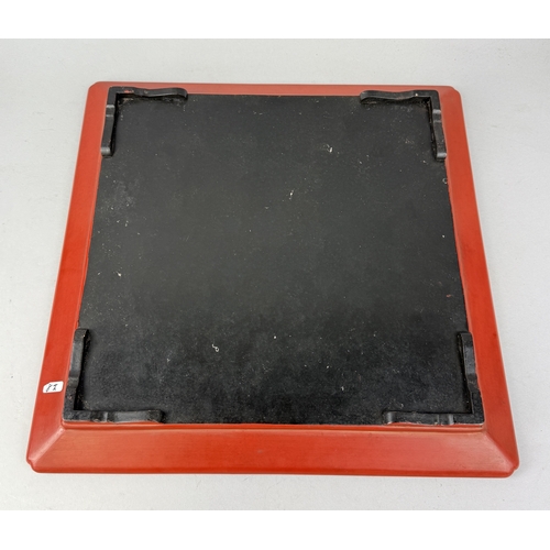 270 - A CHINESE RED LACQUERED SQUARE DISH, MING DYNASTY IN STYLE
39cm x 39cm
 