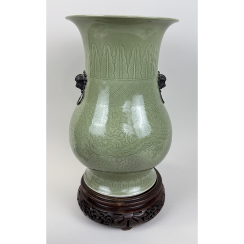 272 - A CHINESE KANGXI STYLE CELADON ZUN VASE
34cm H
Rosewood stand.