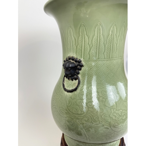 272 - A CHINESE KANGXI STYLE CELADON ZUN VASE
34cm H
Rosewood stand.