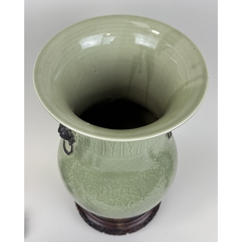 272 - A CHINESE KANGXI STYLE CELADON ZUN VASE
34cm H
Rosewood stand.