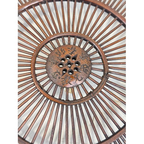 272B - A JAPANESE WOODEN BASKET, SIGNED TO CENTRE
45cm x 35cm