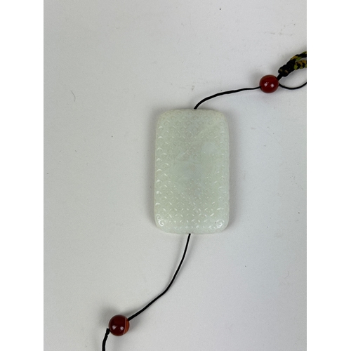 274 - A CHINESE JADE PENDANT
6.5cm L