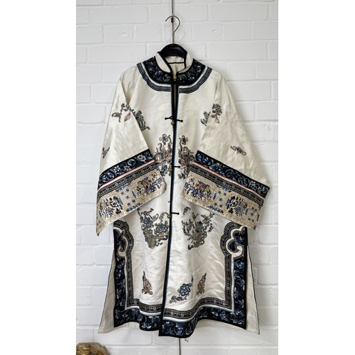276 - A FINE CHINESE EMBROIDERED CREAM SILK COURT ROBE, LATE QING DYNASTY
100cm L