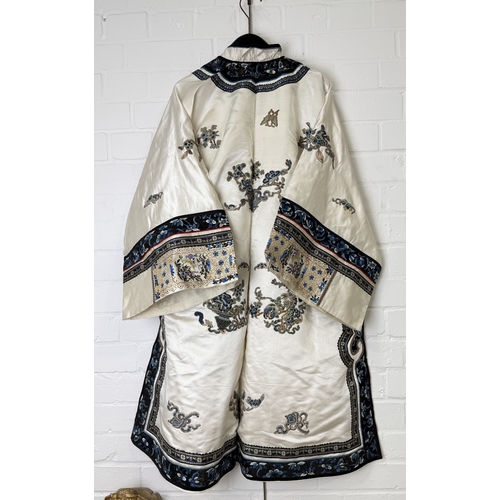 276 - A FINE CHINESE EMBROIDERED CREAM SILK COURT ROBE, LATE QING DYNASTY
100cm L