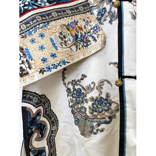 276 - A FINE CHINESE EMBROIDERED CREAM SILK COURT ROBE, LATE QING DYNASTY
100cm L