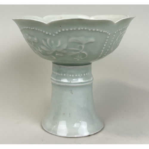 281 - A CHINESE QINGBAI HIGH STEM CUP
Possibly Song dynasty.
12cm H