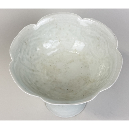 281 - A CHINESE QINGBAI HIGH STEM CUP
Possibly Song dynasty.
12cm H
