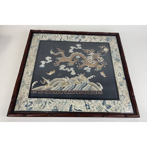 286 - A CHINESE RANK BADGE DEPICTING A DRAGON CHASING THE SUN
Framed and Glazed: 49cm x 44cm
 ... 