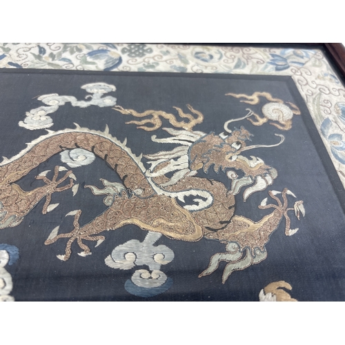 286 - A CHINESE RANK BADGE DEPICTING A DRAGON CHASING THE SUN
Framed and Glazed: 49cm x 44cm
 ... 