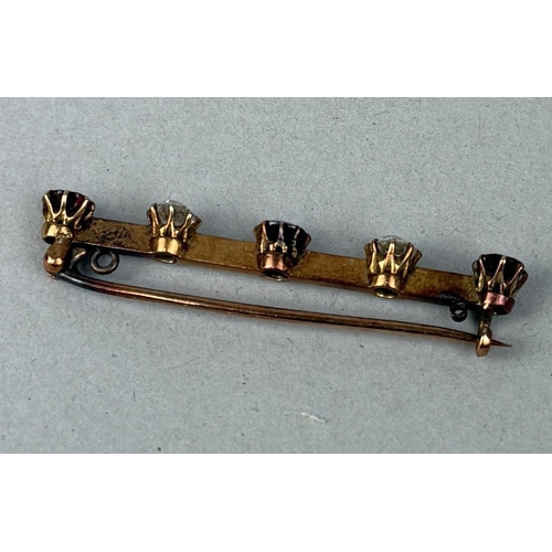 45C - AN ANTIQUE GOLD FIVE STONE BAR BROOCH SET WITH TWO DIAMONDS AND THREE RUBIES
2.4gms