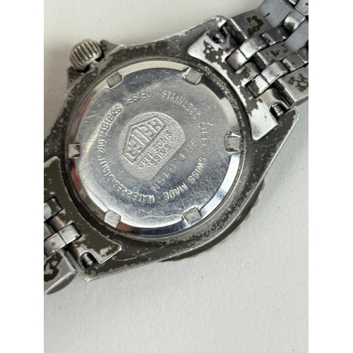 180 - A VINTAGE TAG HEUER 1000 AUTOMATIC 200M WRIST WATCH
 
 