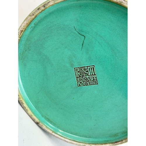 187 - A CHINESE GREEN GLAZED FAUX BAMBOO BRUSH POT
Character mark to verso.
21cm x 16cm... 