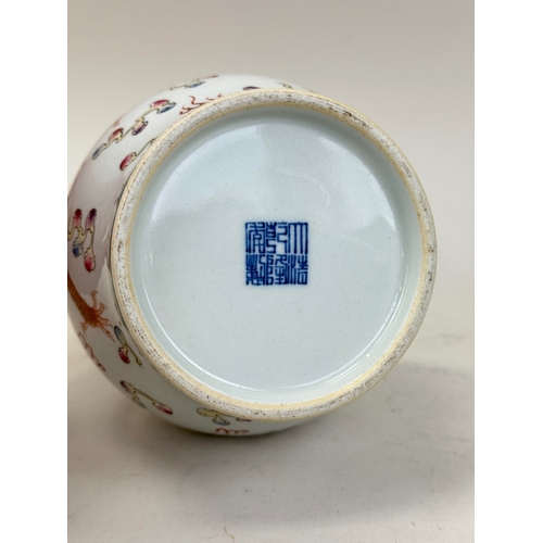 193 - A CHINESE DRAGON VASE WITH GARLIC HEAD
23cm H