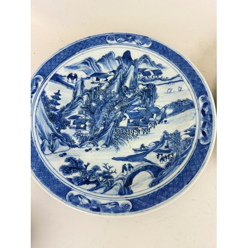 196 - TWO CHINESE BLUE AND WHITE PLATES, EACH WITH FOUR CHARACTER MARK TO VERSO
29 cm width