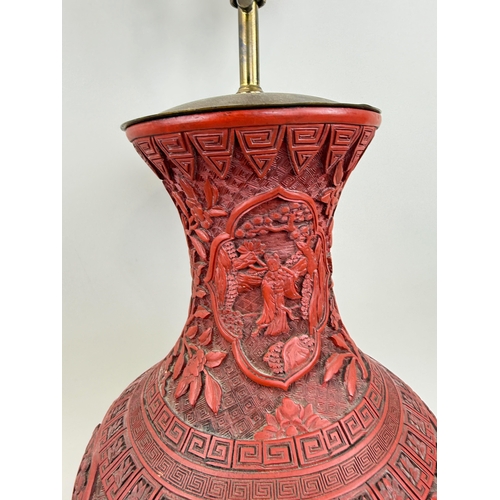 198 - A CHINESE/JAPANESE RED LACQUERED VASE ADAPTED FOR A TABLE LAMP
Vase 48cm H