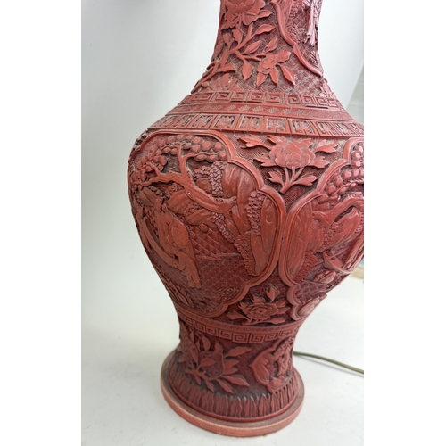 198 - A CHINESE/JAPANESE RED LACQUERED VASE ADAPTED FOR A TABLE LAMP
Vase 48cm H
