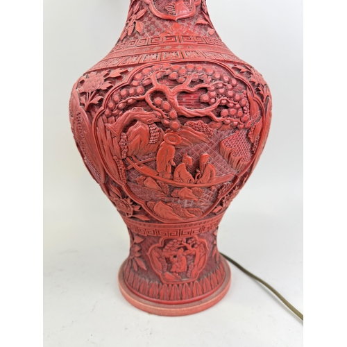198 - A CHINESE/JAPANESE RED LACQUERED VASE ADAPTED FOR A TABLE LAMP
Vase 48cm H