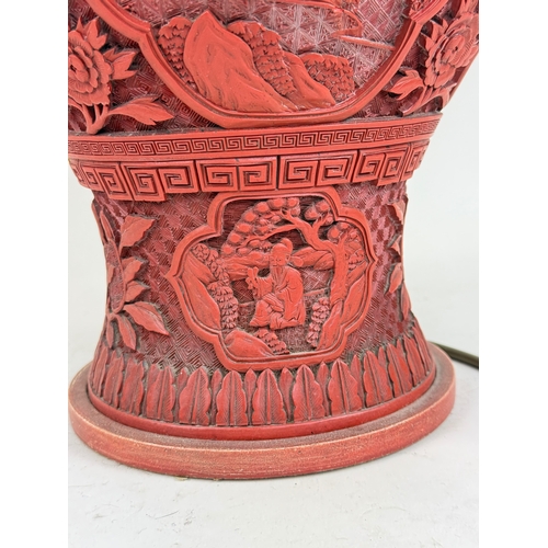 198 - A CHINESE/JAPANESE RED LACQUERED VASE ADAPTED FOR A TABLE LAMP
Vase 48cm H