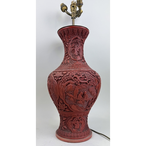 198 - A CHINESE/JAPANESE RED LACQUERED VASE ADAPTED FOR A TABLE LAMP
Vase 48cm H