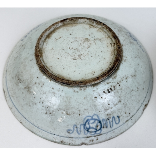 204 - TWO 18TH CENTURY OR EARLIER CHINESE/SOUTH EAST ASIAN BLUE AND WHITE DISHES
Largest 26cm W... 