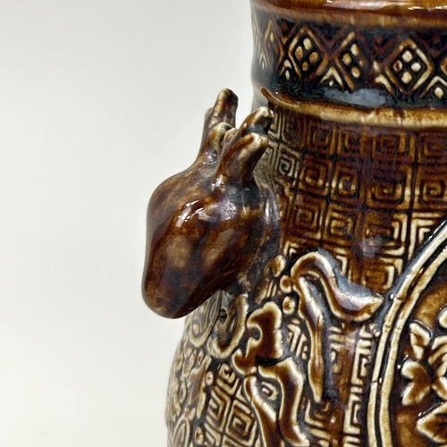 214 - A CHINESE VASE WITH STAG HEAD HANDLES
14.5 cm H