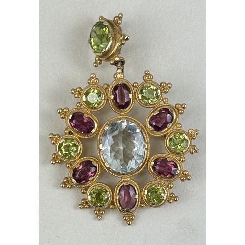 40 - A 9CT GOLD GEM SET PENDANT
Weight: 11.9gms