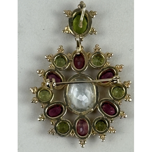 40 - A 9CT GOLD GEM SET PENDANT
Weight: 11.9gms