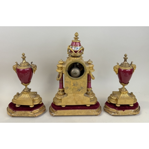 258 - AN ANTIQUE SEVRES STYLE PORCELAIN GARNITURE COMPRISING CLOCK AND TWO URNS
Tallest 43cm H
The porcela... 