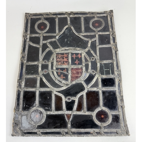 296 - AN ANTIQUE STAINED GLASS WINDOW INSCRIBED ARMS OF HENRY VIII, EMILUS MOLL, LONDON
45cm x 36cm... 
